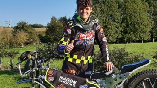 Sam with his racing bike