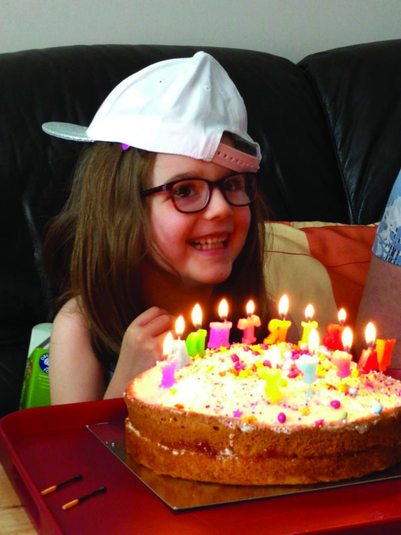 Emma with a birthday cake