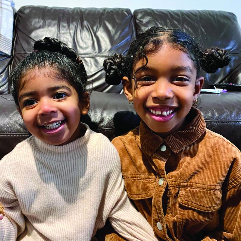 Saffron at home with her sister