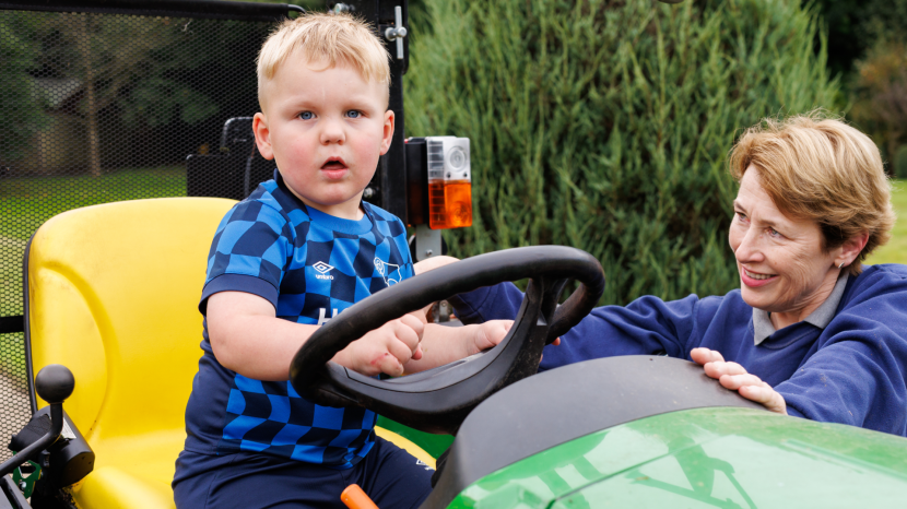 Reuben and Sarah Joyce, Head Gardener, enjoying The Children's Trust grounds